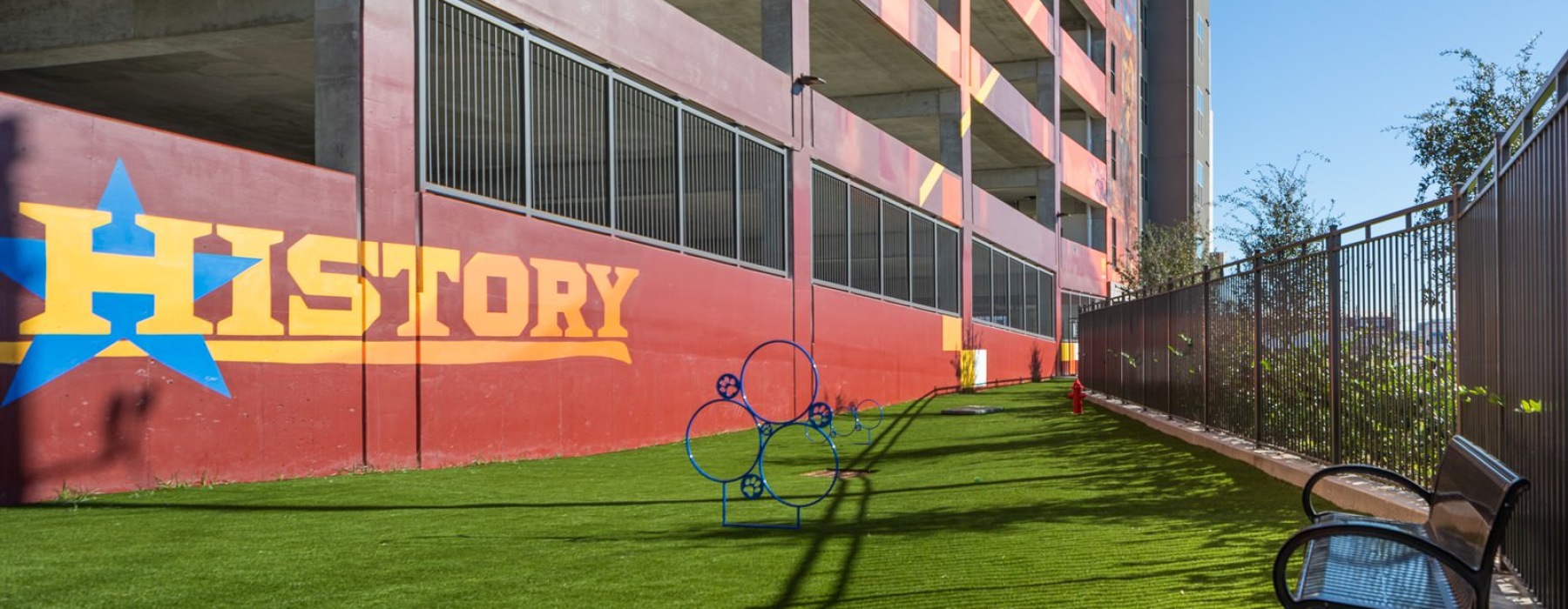a dog park with a bench